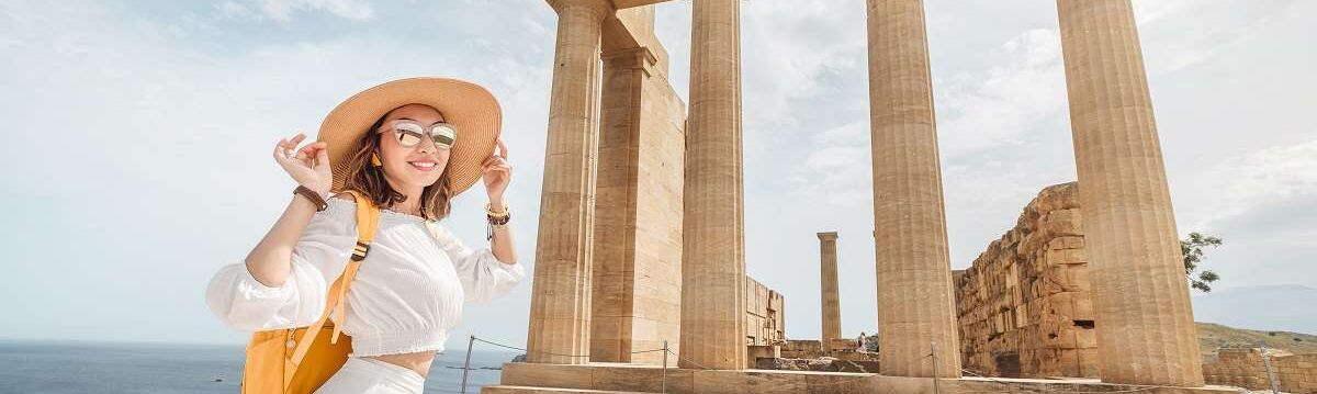 Woman on a solo holiday in Lindos, Greece