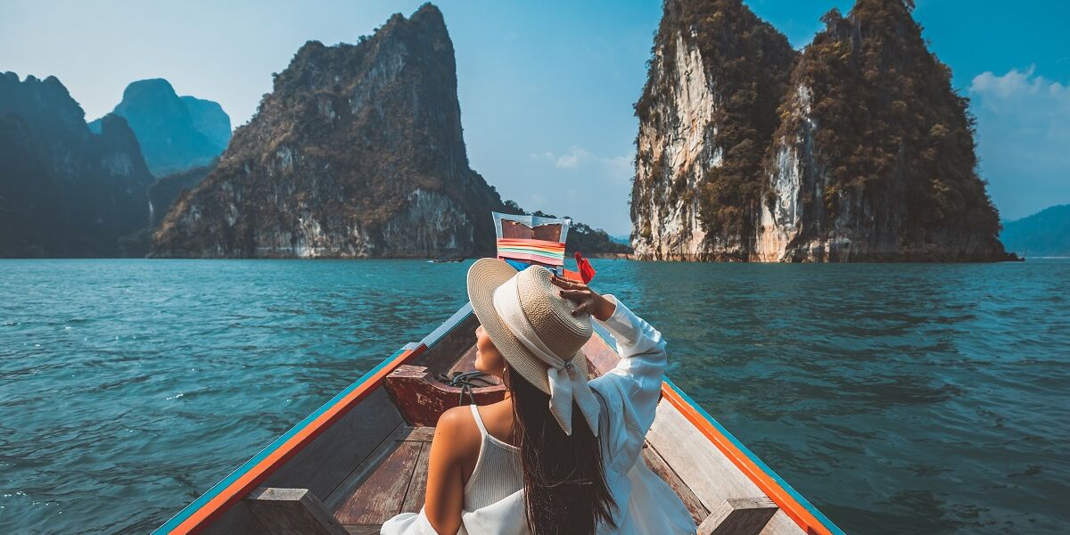 Woman enjoying scenic boat trip