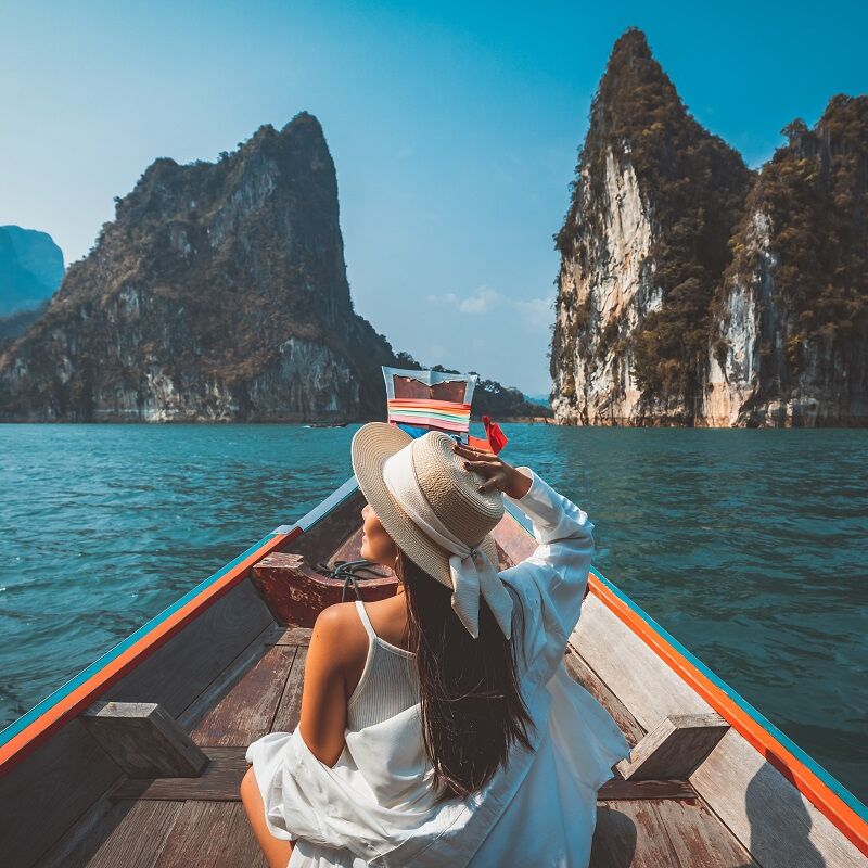 Woman enjoying scenic boat trip