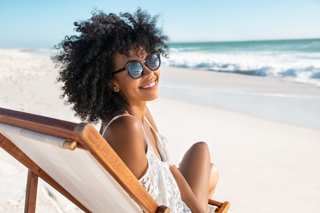 Woman at beach on summer holiday
