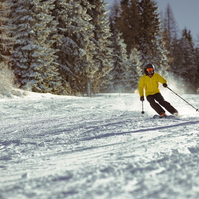 Solo skier skiing in France