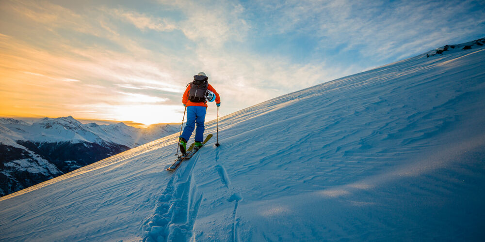 Solo skier on the mountains.